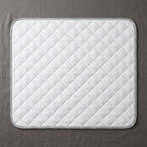 BESIDE bed layer laid flat, overhead view